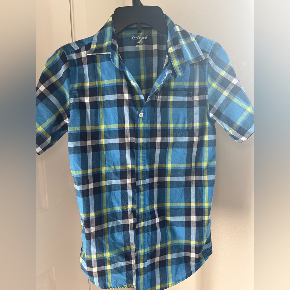 Boys blue checkered button down shirt.